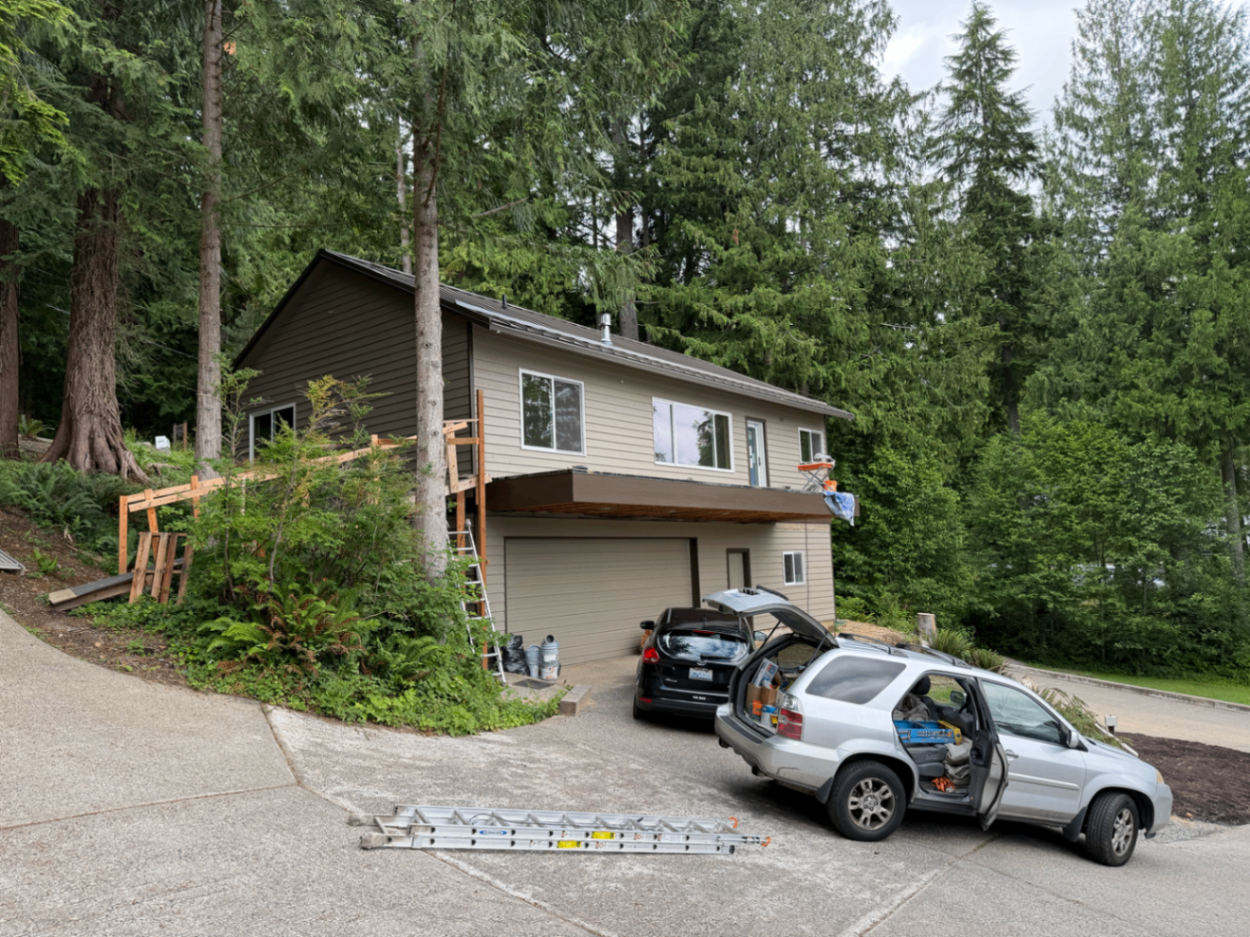 Completed lakefront custom home after exterior painting