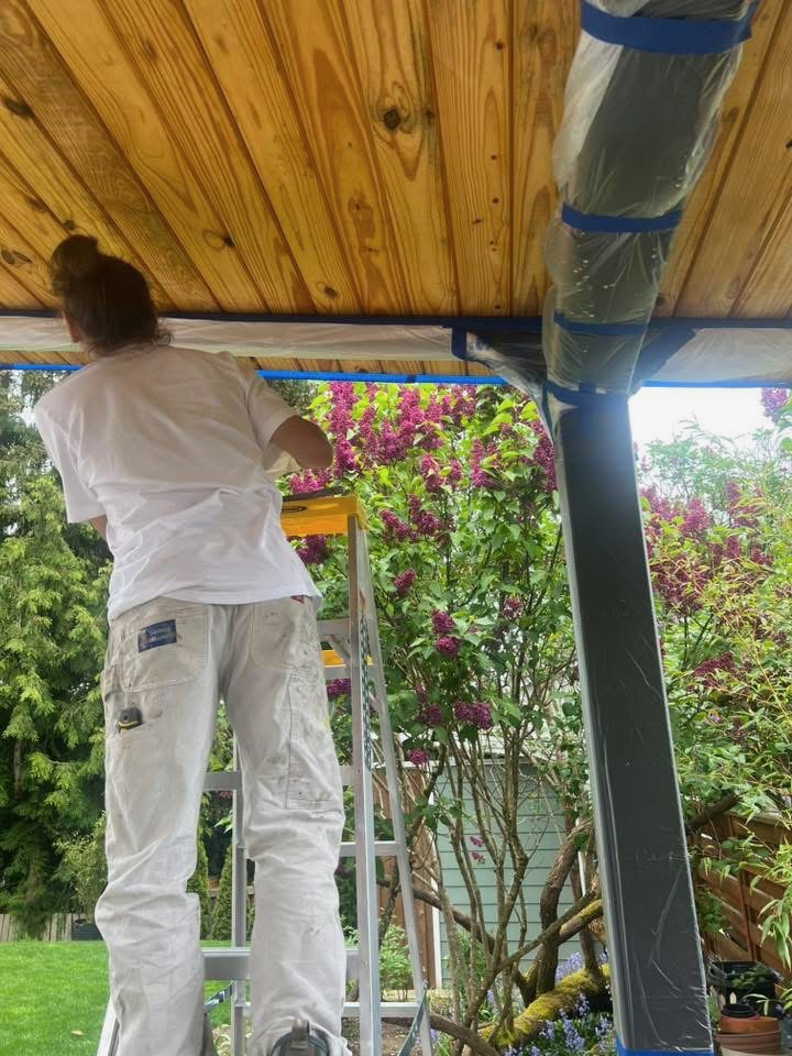 Rhen, owner of Northline Paint & Finish, completing detailed finish work